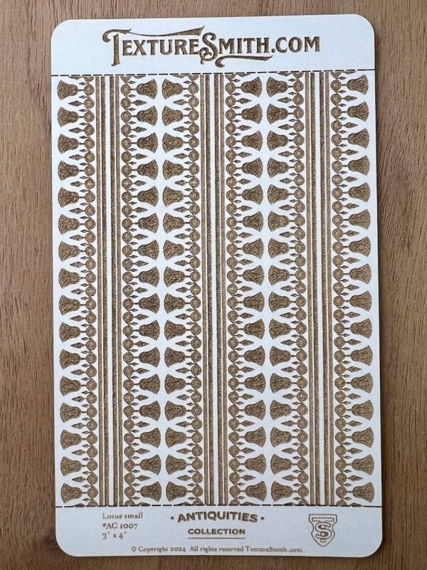 Intricate brown and white patterned fabric with geometric designs.