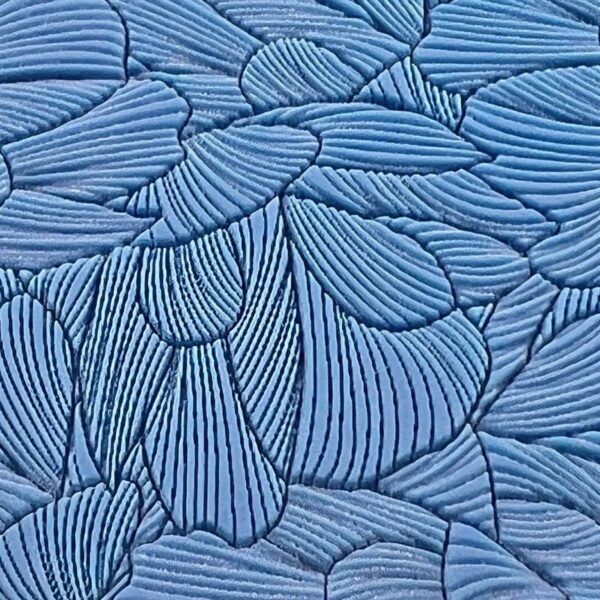 Blue abstract pattern resembling overlapping petals or leaves.