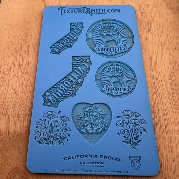 Blue silicone mold with California-themed shapes and designs.