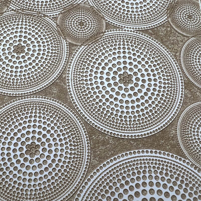 Intricate circular patterns with detailed mesh designs in a neutral color palette.