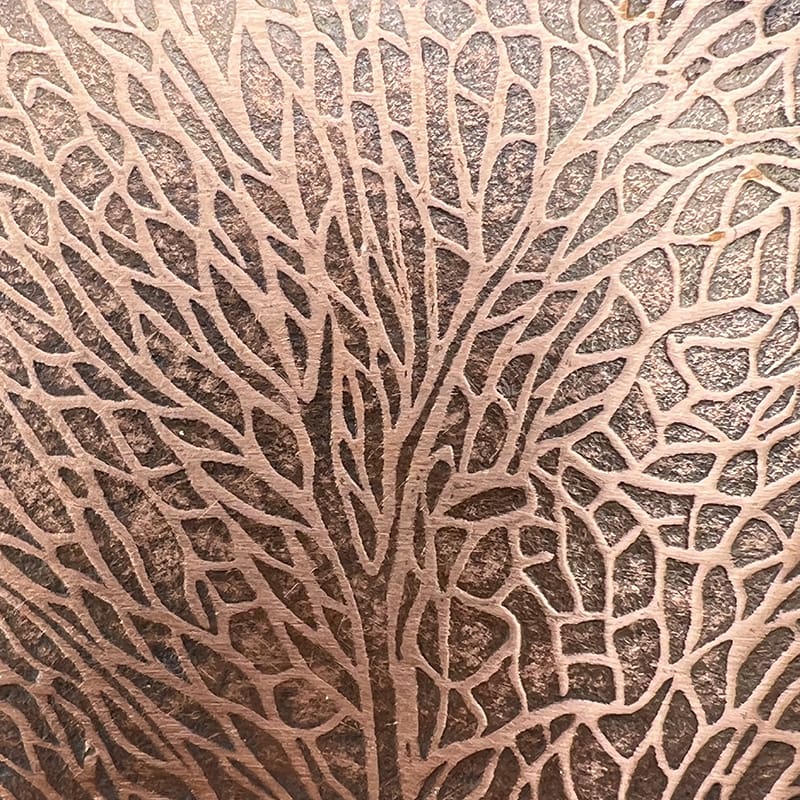 Close-up of a detailed, leaf-like textured pattern.