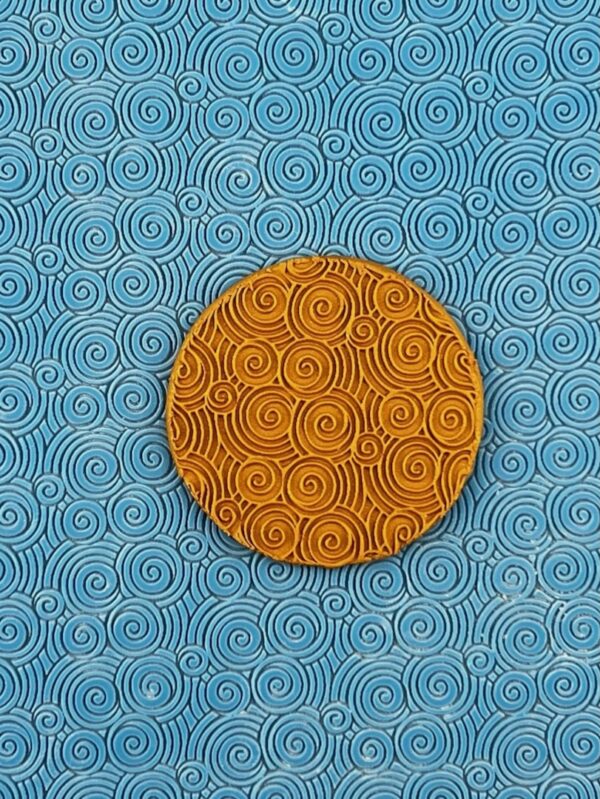 Vibrant blue background with spiral patterns