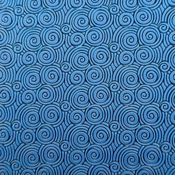 Blue fabric with intricate spiral patterns.