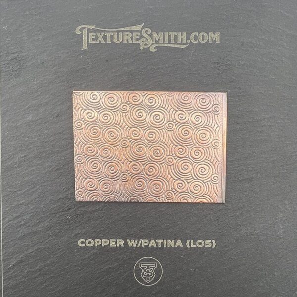 Copper square with wapatina texture on a black background.