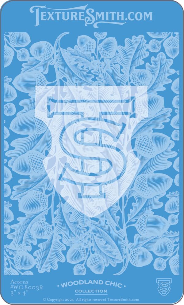 Blue patterned fabric with a white shield logo containing letters S and T.