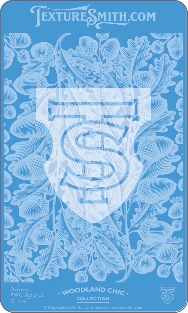 Blue patterned fabric with a white shield logo containing letters S and T.