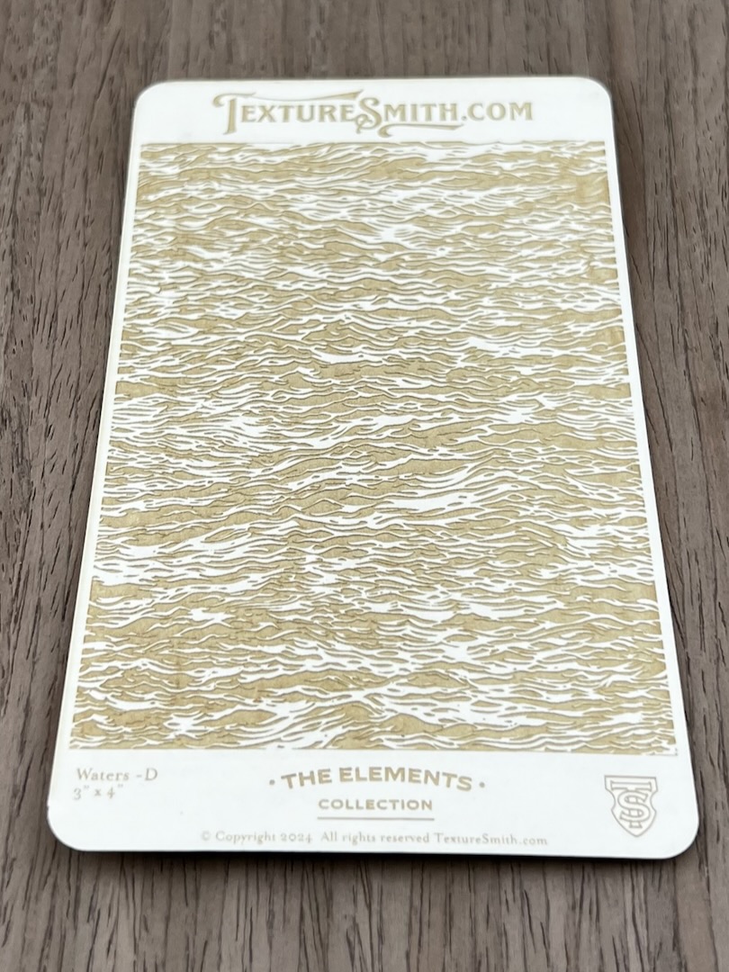 Intricate wave-like texture on card