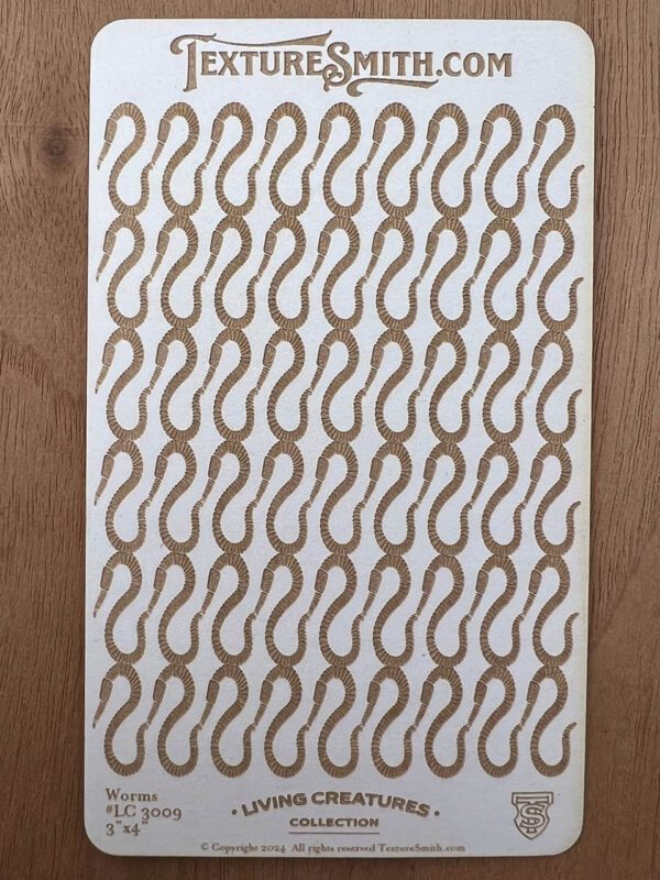 A patterned fabric with a repeating wavy design in brown and beige.