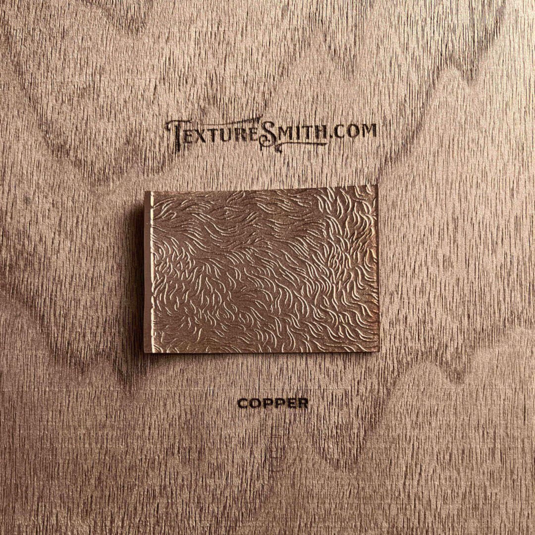 A textured brown wallet on a wooden surface with a logo.