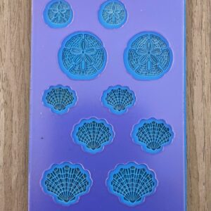 Silicone mold with sand dollar and shell designs