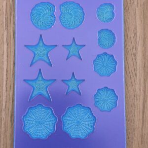 Ocean-themed silicone mold with starfish and shells